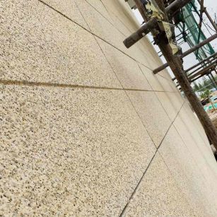 吉林省 黄金麻花岗岩荔枝面外墙干挂石材效果示例