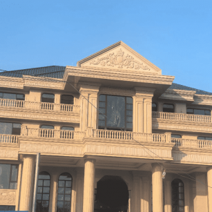 吉林省黄金麻别墅外墙干挂石材效果示例