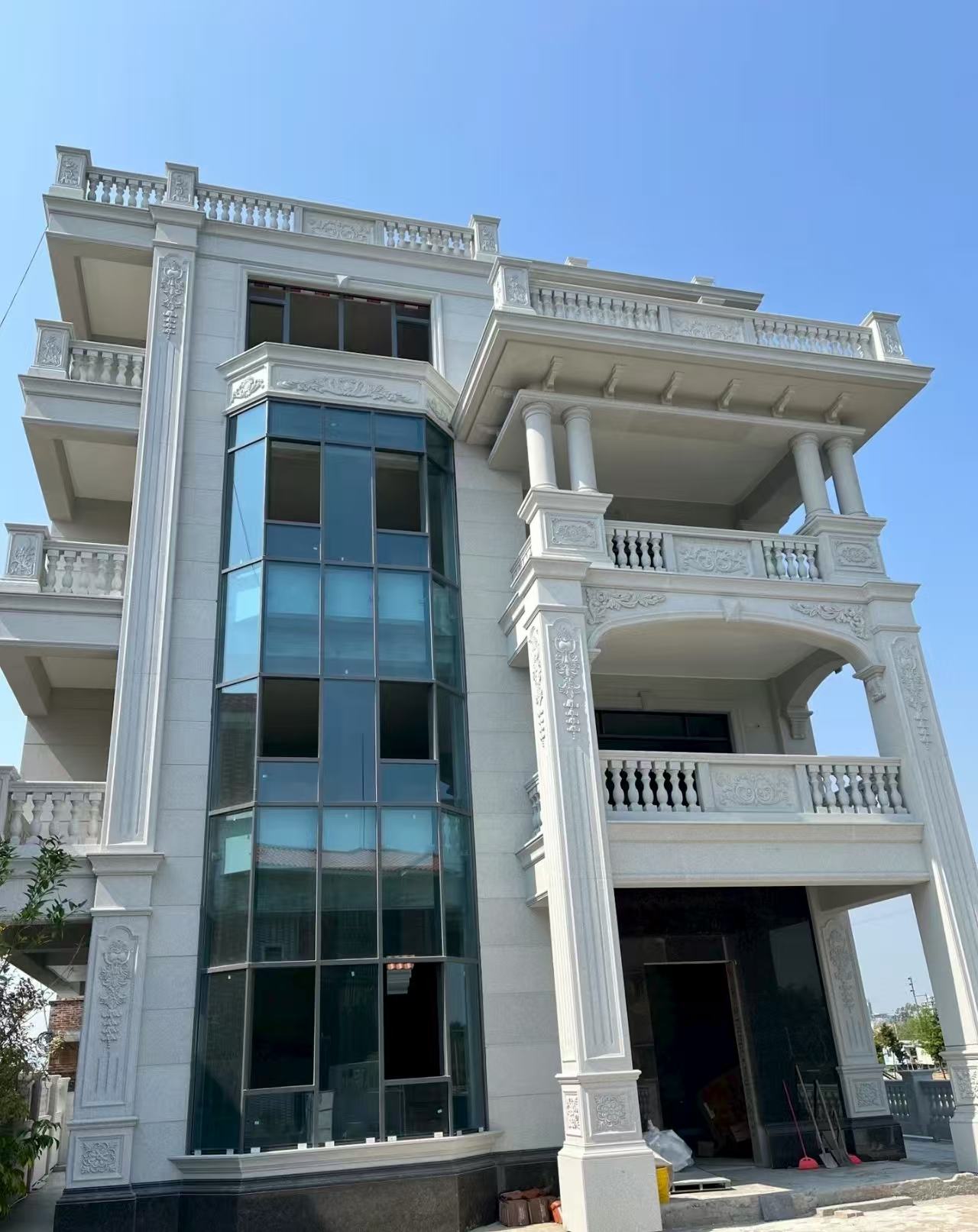 吉林省 白麻花岗岩别墅外墙干挂效果展示