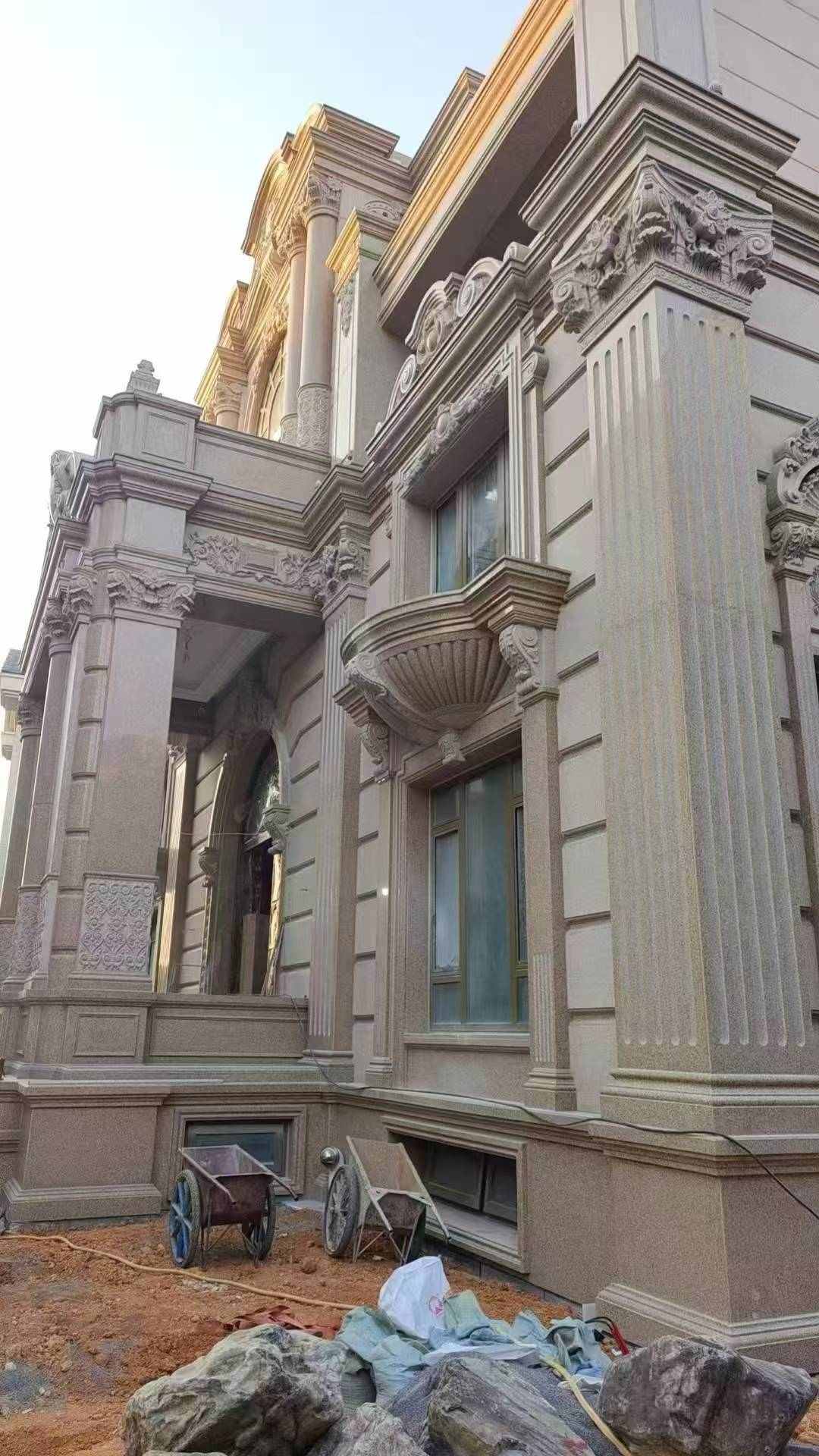 吉林省 黄金麻花岗岩光面别墅外墙干挂施工完成