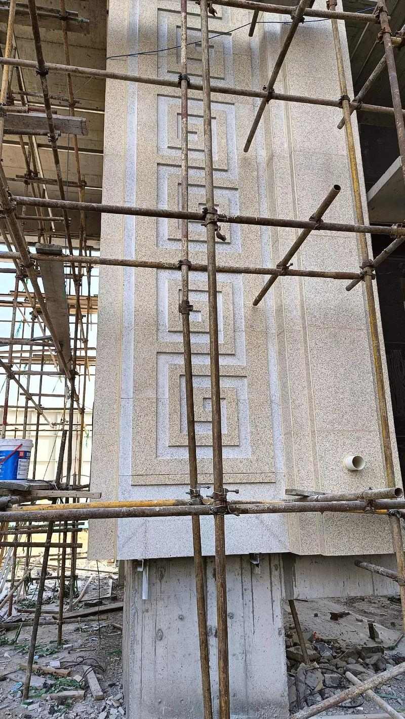 吉林省 黄金麻花岗岩别墅外墙干挂回纹造型效果